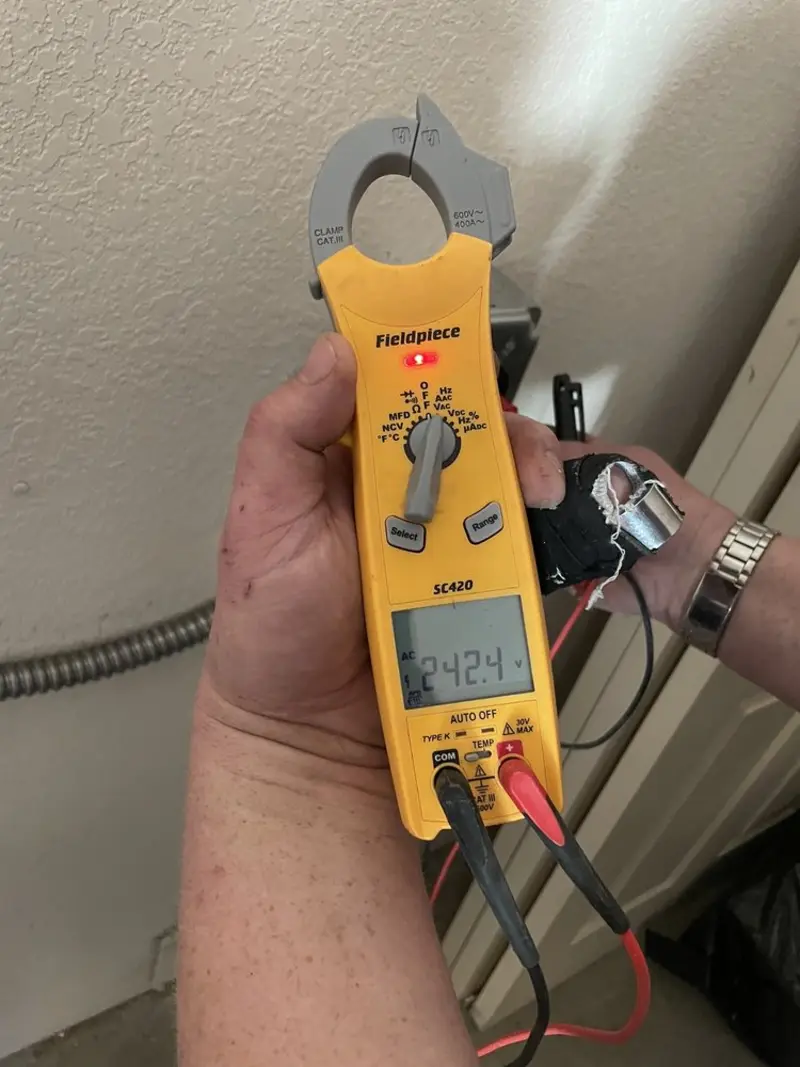 Voltage testing with clamp meter during Generator Installation in Mirrormont
